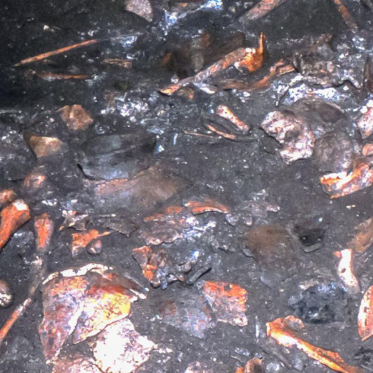 Man walks around he site of Cerro Quemado.