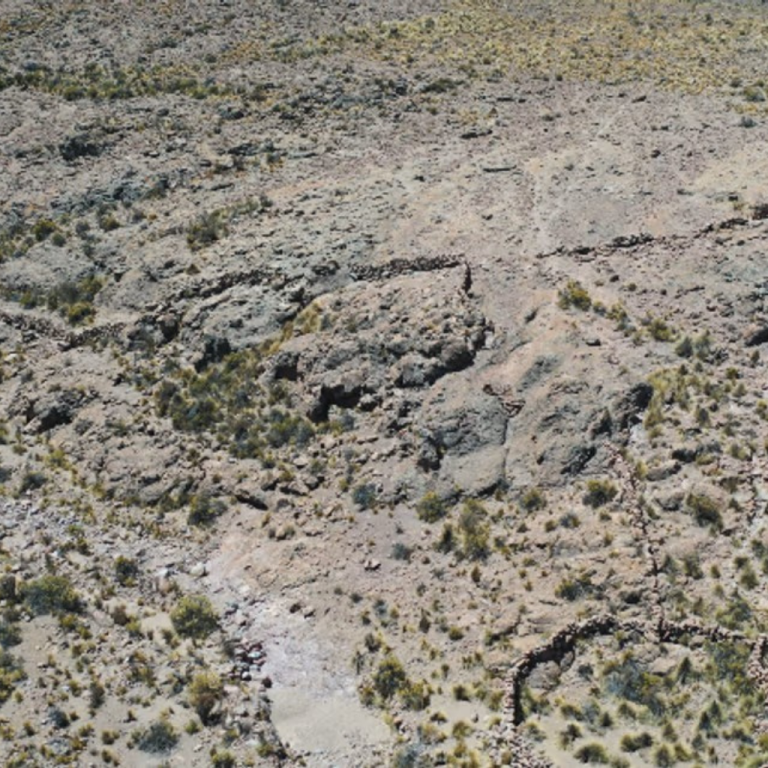 The site of Cerro Quemado Man walks around he site of Cerro Quemado.