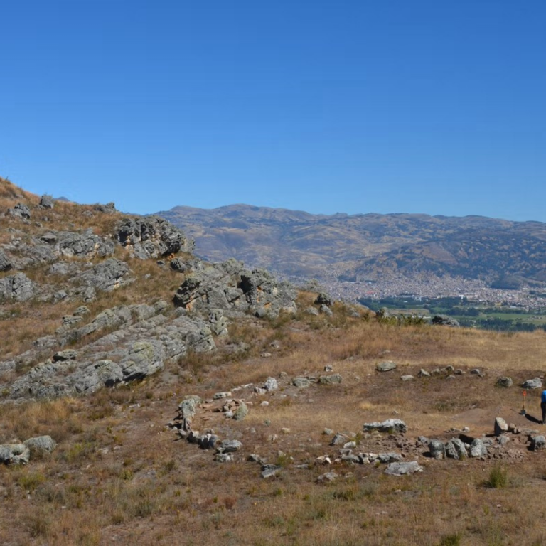 Man walks around he site of Cerro Quemado.