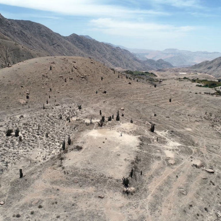 Man walks around he site of Cerro Quemado.