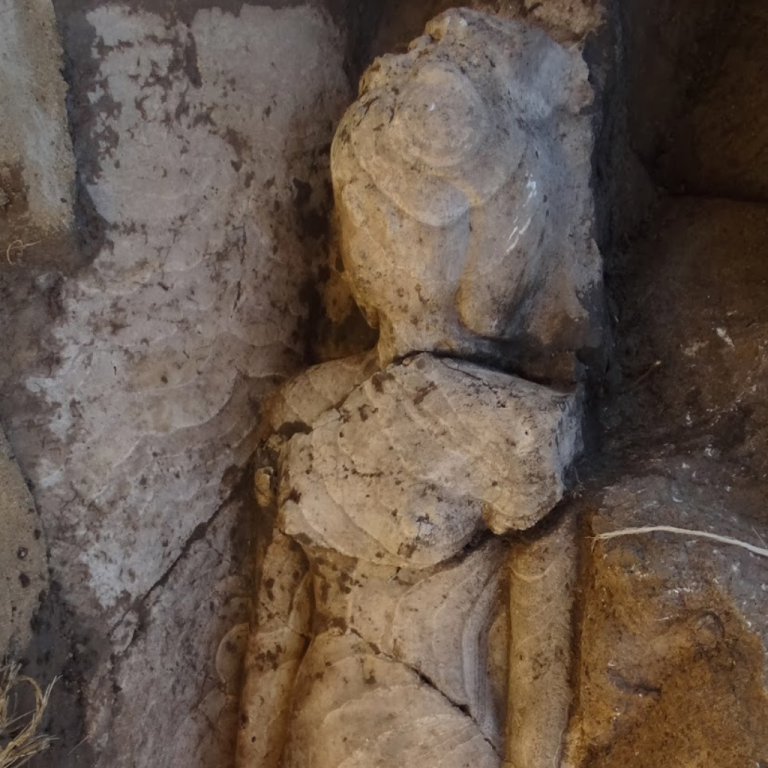Man walks around he site of Cerro Quemado.